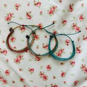 three pura vida bracelets